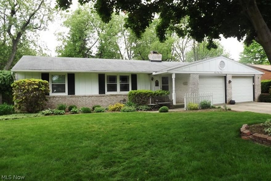 What a cutie! This house is located close to everything, yet it is hidden away at the end of a quiet culdesac, for the best of both worlds! Charm and character abound in this brick ranch, situated in North Canton City School District, one of the most sought after school districts in the county. The home has new windows and a unique floor plan among homes in this era, with an open concept kitchen, dining area and family room, including a fireplace, with access to the covered patio. Creates a wonderfully cozy area, whether you're cooking or watching TV, or both. The wide lot backs up to woods, through which you can see the lights of The Strip at night, without the traffic or noise! The kitchen includes stove and dishwasher. This is a great opportunity!