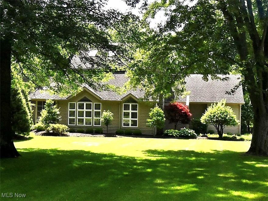 Check out this stunning, well-built 3 bedroom 2400 sq ft contemporary design with open floor plan, attached 2 car garage & a full basement. As you walk in the front door you will be amazed with the two story entry, living room with gas fireplace, window-lined walls, and vaulted ceilings. This home offers a formal dining room with built-in credenza and wet bar, a cozy den with 3 skylights, and a fully equipped eat-in kitchen with built-in breakfast bar, and sliding doors to tiered decking, and view of the picturesque rear yard. This home has a large, first floor master suite with vaulted ceilings, exceptional dressing room with 3 closets and dressing table,  & master bath with dual sinks, soaking tub, shower and private toilet. Additional first floor features are a half bath and large screened porch off of the living room. The unique open staircase allows you to enjoy views of nearly every room, and leads to the second-floor with 2 bedrooms and another full bath. The laundry is located in the spacious full basement that is partially finished, and has high ceilings, and generous storage space.