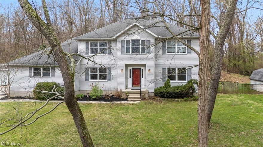 Set on over 26 scenic acres, this two-story home offers the perfect balance of privacy and natural beauty. Featuring 3 bedrooms and 2.5 baths, the home highlights a recently updated kitchen that flows into the casual dining area and welcoming family room--ideal for both daily living and entertaining. A formal dining room provides additional space for hosting, while the front living room offers flexibility as a sitting area or a private first-floor office. Upstairs, you'll find brand new carpet throughout, creating a fresh and inviting feel. The partially finished lower level adds over 800 square feet of additional living space, perfect for a recreation room, home gym, or media area. Step outside to enjoy the peaceful surroundings from the covered deck or additional outdoor seating area. The property also includes a versatile outbuilding--ideal for hobbies, woodworking, or extra storage. The expansive, mostly wooded acreage features a pond and abundant wildlife, making it a dream setting for outdoor enthusiasts, bird watchers, or hunters. From deer and fox to a wide variety of bird species, this property offers a truly serene, nature-filled lifestyle. Your own private retreat in the rolling hills of Central Ohio--don't miss this opportunity.