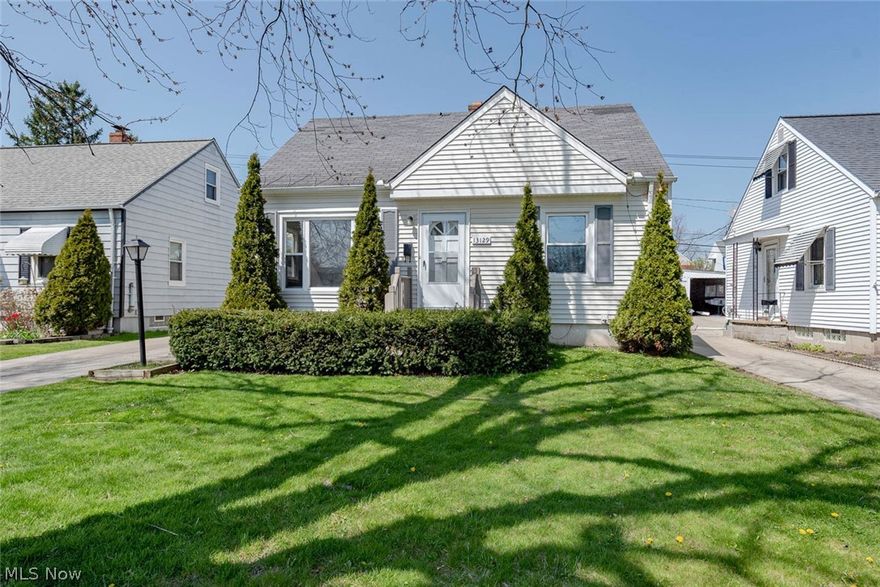 Move right in to this beautifully remodeled cape cod situated close to everything you need in Garfield Heights! This home features an updated kitchen, large bedrooms, and new flooring throughout. All that is missing is you! The spacious living room is illuminated by a large picture window. You're sure to love the kitchen, which boasts stainless steel appliances, new cabinetry and sliding doors that open to the large wooden deck. Two large bedrooms and a remodeled full bath complete the main level. Upstairs, you will find a spacious third bedroom. The lower level is partially finished and includes a recreation room and a laundry area. Other improvements include fresh paint throughout, new storm doors, a new deck and a new garage roof. Outside, you are sure to enjoy relaxing and entertaining friends and family on the deck which overlooks a lovely backyard. Located off of Turney Road, this home is convenient to area shopping and dining destinations, schools and I-480. Do not miss out on t