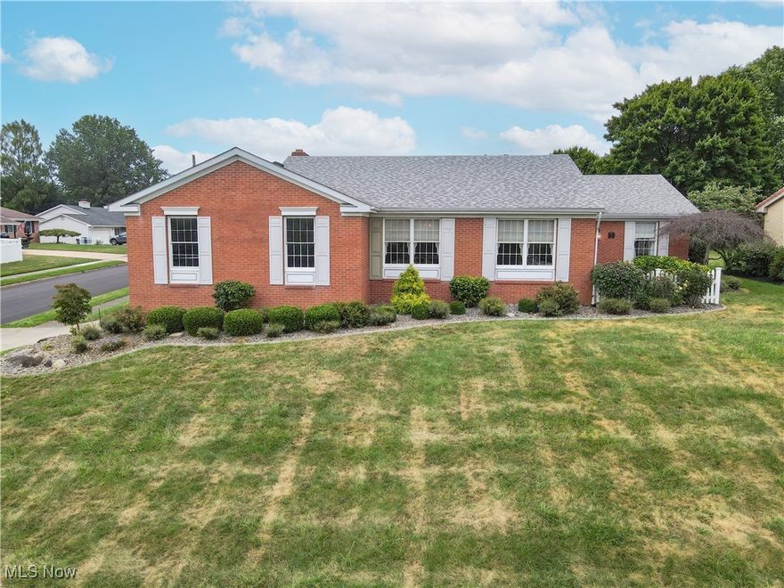 Welcome to this beautifully designed ranch-style residence, offering comfort, style, and thoughtful details throughout. The inviting front foyer leads to a well-appointed layout perfect for family living and entertaining.
To the right of the entrance, find three comfortable bedrooms, including a primary suite with two generous closets and a private full bathroom. An additional full bathroom is conveniently located off the bedroom hallway for guests and family use.
On the left side of the main hall, enjoy a spacious living room that flows seamlessly into a large formal dining area, complete with an elegant chandelier and ample space for gatherings.
The heart of the home is the expansive, open-concept kitchen featuring a large island—perfect for cooking and entertaining. It overlooks a versatile flex area with built-in shelving and a charming brick fireplace, ideal as an eat-in kitchen or connected to the bright, spacious family room.
Step outside through French doors from the family room to relax on the outdoor patio or enjoy a fun game on your private mini basketball court.
The finished basement offers a large family room with a second brick fireplace, a half bathroom, and abundant storage space. The remaining basement area is ready for your personal touch and finishing ideas.
This home combines comfort, functionality, and style in a perfect package—ready to welcome you home!