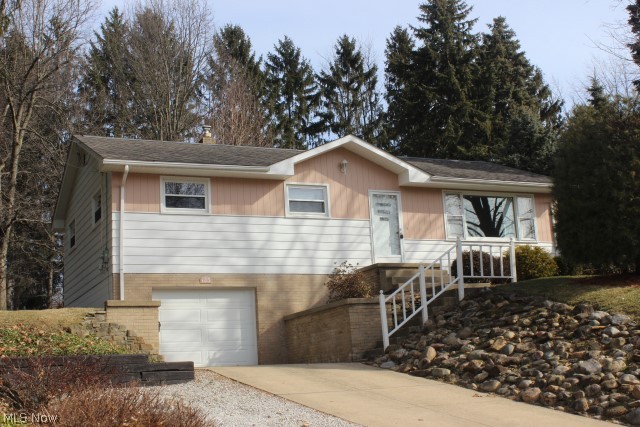 An absolute pleasure to show this pretty & pristine 3 bedroom, 2 bath raised ranch w/1496SF* Neutral décor throughout, numerous updates & convenient location in City of Green* Wood floors under carpet in living room, hall & bedrooms* Updates include shingles (6/2006), breaker box (12/2013), pressure tank (12/2011), humidifier (2011), H20 (2004), windows (except picture window in living room) & patio door (1997)* Applianced kitchen with range, refrigerator & dishwasher* Bedrooms with plantation blinds* Bright & cheerful lower level rec room* 13'5 x 22'5 attached one car garage* Washer & dryer* Private & treed back yard with patio & storage shed* Home warranty provided* A must see!