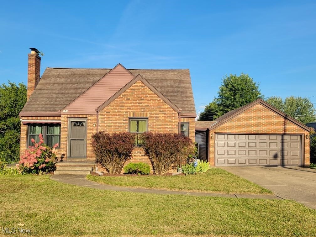 Charming brick story-and-a-half home with many updates! Find a welcoming eat-in kitchen featuring tile backsplash and newer appliances (refrigerator 2023, oven, dishwasher, 2021). Enjoy cozy evenings by the wood-burning fireplace in the living area. The main bath offers a shower/tub with a newer insert. The hardwood floors add timeless appeal. Comfort is ensured with a new furnace, central air (2022), and added insulation, plus a reverse osmosis system. The finished lower-level family room boasts glass block windows and nature stone flooring. Outdoor find a private backyard with a 6-ft fence and a 2-car detached garage with a newer vinyl door. Truly a move-in ready home with both character and convenience! Open House Sat 9/6/25