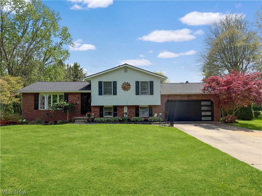 Welcome to this well-maintained 3-bedroom, 2-bath home located in desirable Uniontown within the Springfield Local School District. Situated on a spacious .78-acre lot, this property offers a perfect blend of comfort, updates, and privacy. The home features a functional layout with multiple living spaces, including a bright living room, a cozy family room, and a beautiful 4-season sunroom—perfect for year-round enjoyment, relaxing, or entertaining. The kitchen offers ample cabinetry, built-in features, and flows nicely into the dining and living areas, creating a comfortable everyday living space. Recent improvements provide peace of mind, including updated flooring, roof, furnace, and both bathrooms. Additional upgrades include a new well pump and pressure tank. The home also features Anderson windows—wood interior with vinyl exterior—providing durability, efficiency, and classic appeal. Step outside to enjoy the private backyard surrounded by mature landscaping, along with a patio ideal for outdoor gatherings. A 2-car attached garage and storage shed offer additional space and convenience. This home combines space, functionality, and key updates in a sought-after location—ready for its next owner to enjoy.
