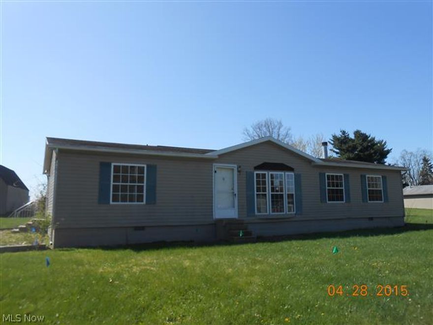 Newer modular home on 3/4 acre lot with large garage, living room, kitchen with dinette area, family room with fireplace, 3 bedrooms including master bedroom with master bath.  Equal Housing Opportunity.  Sells As Is.