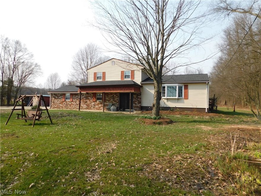 Welcome home to this beautiful 4 level split on over 8 acres! Very spacious house with an awesome layout. Enjoy your morning coffee on the back deck and watch the wildlife by the pond. The back deck is the perfect star gazing location at night in the summer. The property has 3 apple trees, the apples are great for baking and applesauce.  There is an enclosed patio great for entertaining on those rainy days.  Kitchen updated in 2015, granite counter tops and raised dishwasher cabinet. Public water ran in 2015 and septic installed in 2015, running on 2018 operating permit. Appliances are negotiable. The yard features many types of flowers that come back every year. Comes with one year Home Warranty!