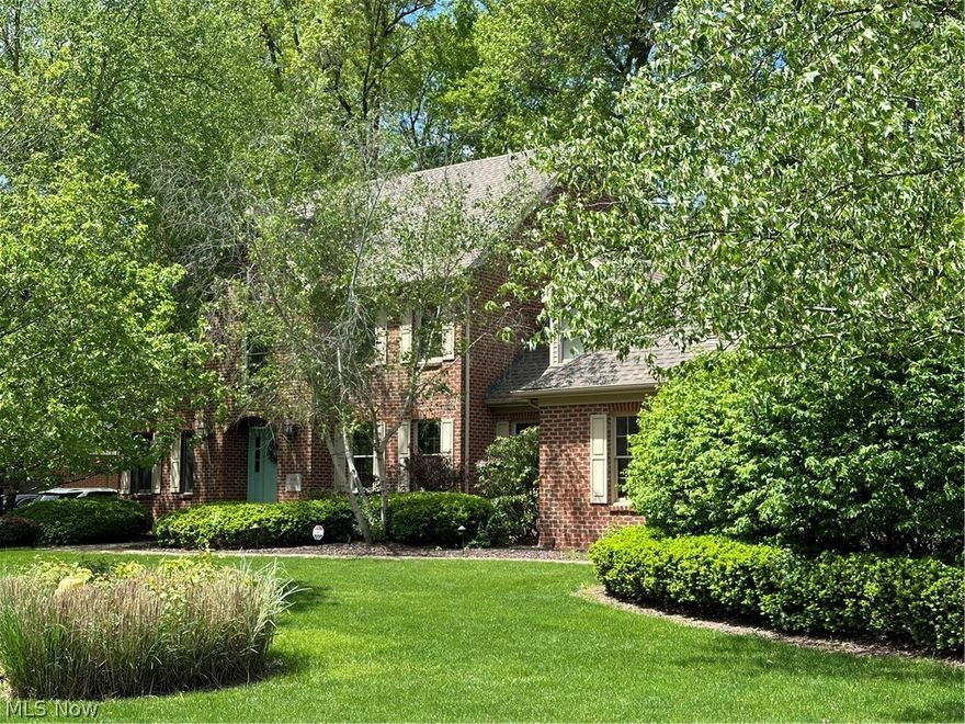 Enter the two-story foyer in this very comfortable, large all brick home in a beautiful, desirable,quiet neighborhood nestled by Mill Creek Park. 4 bedrooms and a first floor office that could be a bedroom, 3 1/2 baths. The entire first floor is hardwood (with an interesting history)an updated designer kitchen, granite countertops with Viking range, Sub Zero refrigerator, two dishwashers; built in Butler’s pantry, center island wok station, lots of cabinet space, bay window with custom breakfast set; open floor  plan to the family room featuring fireplace, coffered ceiling,  and French doors leading to a spacious screened sun porch. Mud room, unique half bath and nice sized laundry. Study/library/ office with fireplace and built in bookcase.   
Second floor: huge Master bedroom has a cozy fireplace, and en-suite bath granite, double sinks, tiled separate shower from large, soaking tub. 3 additional large bedrooms, one of which has full bath plus another full main bath upstairs. 3 car garage. Beautiful landscape, fire pit; wood fence and a paver brick courtyard/patio to enjoy on summer nights. Close to dining, shopping, golf course.