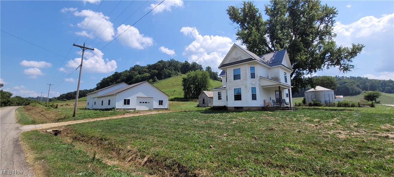 Situated on a spacious 11.5 acres this turn of the century 2 story is full of charm. On the main floor is an open kitchen/living/dining area, mud room, pantry, a bathroom and a potential 4th bedroom/ formal dining room. Upstairs are 3 large bedrooms and all this sits on a full walkout basement with a covered front porch. Moving outside, the home has had some updates done including newer siding, metal roof, and some newer vinyl windows. In 2019 the owner added a 36’ X 76’ shop/barn combo building. The shop has concrete floors, drains, and is insulated, the barn portion has 3 stalls and access to 3+ acres of pasture space. Some of which is already fenced and ready to go. Utilities include woodburner heat, private well and septic and electric at the road. All in all, this property has a lot to offer and only needs a little TLC to complete it. Call today for your private showing.