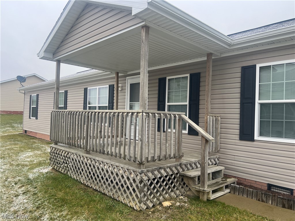 Darling 4 bedroom 2 bath located just minutes from i70 the Ohio Valley Mall and many restaurants. Nice open floor plan.The kitchen has great cabinet space along with an island. There is a master bedroom with a full bath, plus 3 additional bedrooms. Home is heated with electric but there is also is a newer supplemental gas heater. A 22.7 x 19.2 garage attached to the home allowing for 2 cars to easily fit. Enjoy the front porch during the nicer weather months. The association fee covers the trash, lawn care and snow removal.
