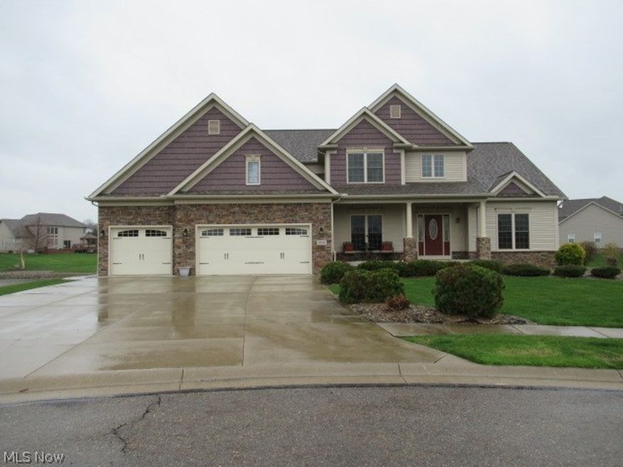 GREAT LOCATION for this 4 BR 3.5 BA home in Lake Twp.  Located on a cul-de-sac w/pond views.  Large maintenance free deck and fire pit area.   Basement is finished w/large rec room w/bar area, 2 additional rooms and full bath.  Three car attached garage.  First floor master bedroom w/access to deck, walk-in closet and large master bath w/double sinks.  Located in The Enclave Development w/sidewalks, lighted streets, clubhouse and inground pool.   This house will make a great place to call home!