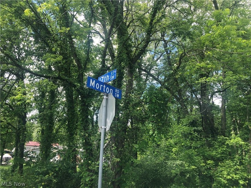 Corner lot, located in Tuslaw schools. This property has been previously approved for a septic system to support a 2 bedroom, 2 bathroom home.