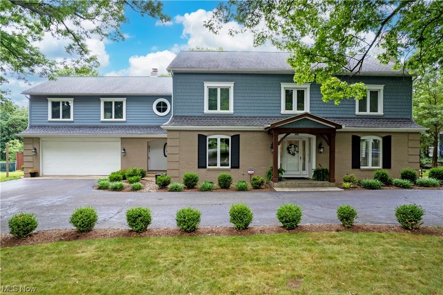 Welcome to this remarkable stately home nestled in the heart of Wooster, offering an impressive 4,400+ square feet of exquisite living space. This residence is a true must-see, boasting a harmonious blend of classic elegance and modern amenities. The main level provides an inviting ambiance with a cozy family room featuring a fireplace, a spacious living room with another fireplace, and a formal dining room, perfect for hosting gatherings. The recently updated eat-in kitchen showcases new countertops, sink, and dishwasher.  Additionally, a dedicated office space and a full bath enhance the convenience of this home.  You'll be captivated by the timeless charm of hardwood floors, intricate crown moldings, and beautifully crafted built-ins, adding character to every room. Upstairs, the grandeur continues with a large primary bedroom featuring a trey ceiling, a luxurious bath with a walk-in closet, and yet another fireplace. Four additional bedrooms, each adorned with new flooring, offer versatility and comfort. One of these bedrooms includes its own full bath and laundry facilities, ideal for guests or use as an in-law suite. A cozy reading nook, a laundry room, and another full bath complete the second floor, ensuring your every need is met. Outside, the lush landscaping and inviting porch beckon you to unwind and savor the tranquil surroundings.  Don't miss the opportunity to make it your own and experience the unparalleled elegance it has to offer.