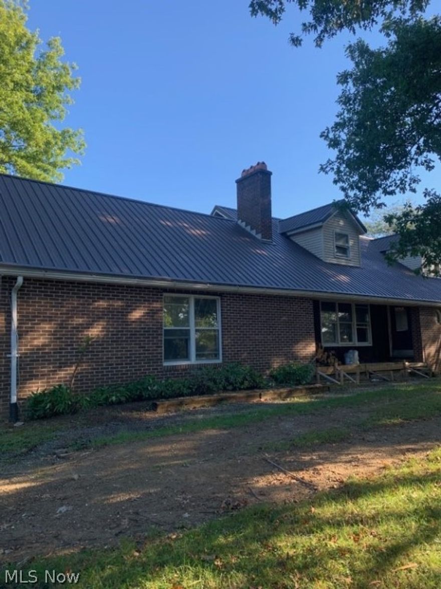 REALTOR OWNED. Newly renovated  Cape Cod. 3 BR's, 2 full bath.  New metal roof, new HVAC.  New paint & appliances. (2) newly renovated baths. Large pole barn.