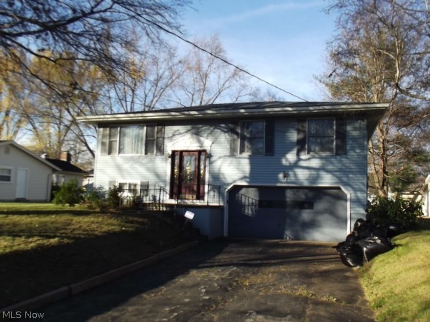 This home features 3 bedrooms, 1.5 baths,  oak kitchen w/all appliances, spacious family room with wet bar for entertaining, updated bathroom & newer carpeting on all bedrooms. Large deck that opens to a nice back yard, 2 car attached garage & a quiet location. Immediate possession is available on this great home!