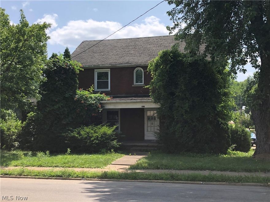 Check out this grand, all brick, Colonial home.  Plenty of living space, with 3 bedrooms, and a full bath and a half.  Situation on a corner lot, and with a private fenced in back yard.  Large living areas on the main level.  Bring your creative eye, and imagine all the possibilities.