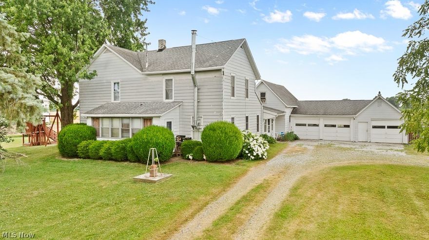 Hobby Farm Alert! Marlington schools - 2 acres, 5 bedrooms, 2 1/2 baths with an extra summer home. 3 car garage, 2 sheds, chicken coop, lots of fruit trees plus much more! Lots of room to roam. No close neighbors, very nice piece of property to call home. First-floor laundry, with a wood burner in the living room, mostly newer windows, updated electric, roof approx. 15 years old. 2 septics and a well that have already been tested and approved.  Come take a look! Call anytime for a showing or questions.