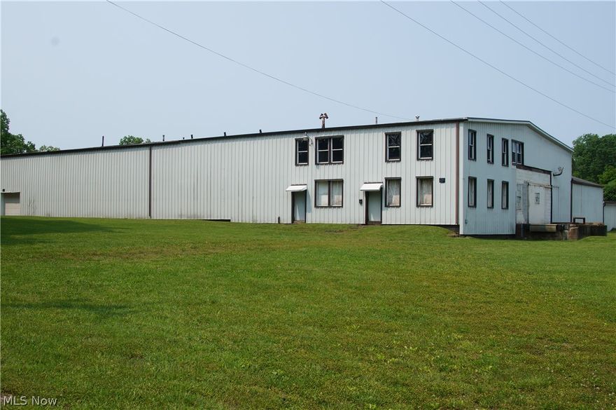 Light Manufacturing Office /Warehouse Building on 1.7 acres in Ravenna City.  All the space is connected with four separate sections, with one space having an upstairs for office or storage.  There is 3 phase Electric, Gas, city water and sewer along with an external loading dock and three drive-in doors.  Over 26,000 sq. ft. with sections ranging from 3,000 to 9,000 sq. ft.