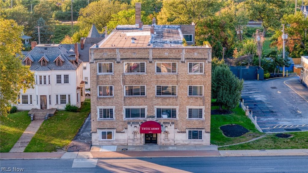 Photo of 13671 Euclid Avenue, East Cleveland, OH 44112 (MLS # 5200225)