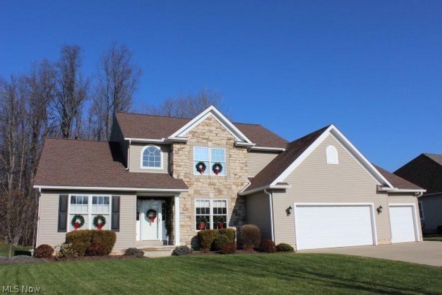 Lovely one owner soft contemporary in Kings Ridge Estates built 2005 but shows almost like new* 1.5 story with 4 bedrooms, 2.5 baths, 2575SF, 1st floor master & 3 car garage* 16' foyer entry with wood floor* 2 story Great room with stone gas log fireplace, mantle & ceiling fan* Formal dining room* Vaulted sun room wrapped with windows & slider to stamped patio* Open & spacious kitchen with Kraft Maid cabinets, island, ceramic floor & back splash, walk in pantry & stainless appliances (range, refrigerator, dishwasher, microwave) & disposal* 1st floor laundry with utility sink cabinet & ceramic floor & 1/2 bath* Vaulted 1st floor master with fan, walk in closet & master bath with double vanity, separate shower, jetted tub & ceramic floor* Loft overlooking Great room (could be 4th bedroom)* 2nd level with 2 bedrooms & bath* 12 course poured basement, plumbed for bath & built with waterproofing/insulation system* Anderson tilt in windows* 30 year shingles* 3 car with 2 openers, hot & cold