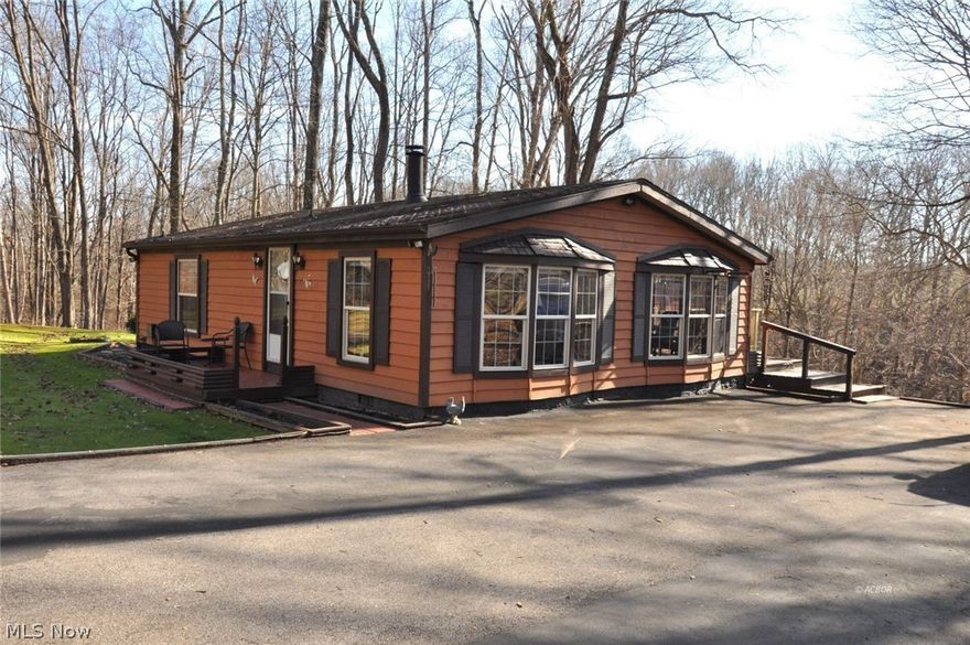 Welcome to 2620 Burnett Road in Cutler, Ohio - a peaceful country property set on approximately 2 acres in scenic rural Washington County. This well-maintained manufactured home offers 2 bedrooms and 2 full bathrooms, providing a comfortable and functional layout for everyday living. Recent updates include newer flooring and a newer furnace, adding both style and efficiency. Two bay windows fill the home with natural light and enhance the open, welcoming feel throughout. The home also features an Amish-built sunroom overlooking the rear patio, creating a bright and inviting space to relax and enjoy the surrounding countryside.Outside, the property offers excellent versatility with three Amish-built storage buildings, one of which is designed to function as a garage-ideal for vehicles, equipment, or workshop space. A blacktop driveway provides easy access and ample parking. With open space, privacy, and a beautiful rural setting, this property offers a great opportunity for anyone seeking a quiet country lifestyle while still being within reach of local amenities.