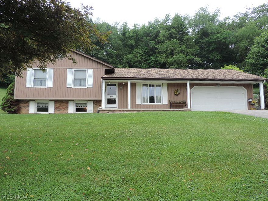 Immaculate home in United School District! Move in condition. 3 BR, 2 baths, large eat in kitchen w/all appliances. Lower level has family room w/beautiful FP, laundry room w/washer & dryer included, and 1/2 bath. Lots of closet space. Security system. Attached 2 car garage & an extra 24 X 24 heated garage w/workshop. Beautiful lot with grape arbor and more. Additional 24 X 36 building/workshop has 9' door, 7' door and concrete floor, can be purchased separately, please look in photo section for picture of building. Plat map included in attachments.