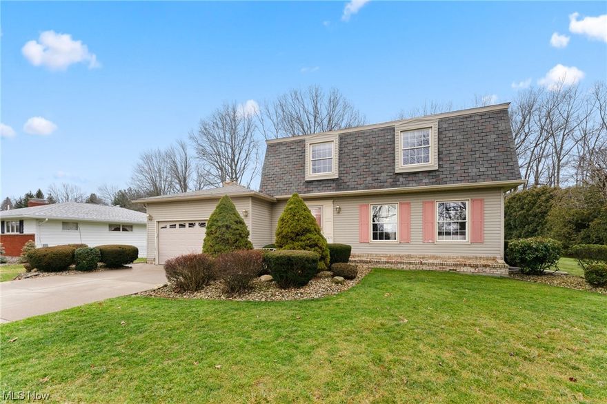 This 2 Story Brick and Vinyl Home is located on a beautiful level lot 100x 220 1/2 acre lot.  Oversized Driveway with an extra drive on the side, with an attached 2 car garage. A Foyer welcomes you with hardwood flooring by Baird Brothers and an all glass storm door to let the light through the foyer. Newer replacement widows, all new faucets, toilets, piping & valves. Nice size rooms.  Formal Living and Dining Room open to each other.  The Family Room has a wood burning masonry fire place with a raise hearth.  A new 6' Anderson glass sliding door to the back deck with and ideal back yard.  The chimney of the Fireplace has been checked by CMZ chimney. Ohio State Water Proofed basement with warranty $75 per year. The roof has had all the Boots & exhaust piping done by Groover.  The Kitchen has lots of cabinets and storage.  The Kitchen is open to the Dinette area and steps down to the Family Room.  All the Bedrooms are spacious and 2 Full Baths upstairs.  All appliances stay including the washer and dryer which are newer.  The mechanics of the home have been maintained.  Just move in !!!