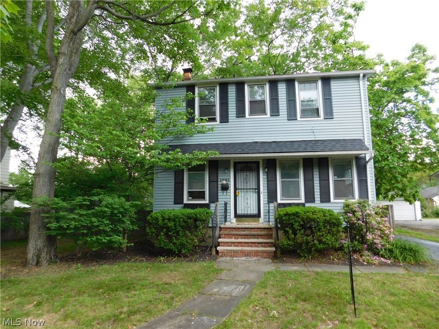 Three bedroom colonial in the heart of Cleveland Heights! A short drive to Coventry, University Circle and downtown, this clean home has many great features not the least of which is its double size lot fully fenced for privacy! Freshly painted throughout with new carpeting (2015) in all the BRs and living room with newer hardwood floors in the dining room. Kitchen recently updated with freshly painted cabinets, new tile flooring (2017) and newer counters.  Updated full bathroom with new plank tile flooring (2017). Enjoy morning coffee on the rear screened porch and entertain family and friends on the large deck overlooking fabulous back yard! Nice size two car garage and many other great features! Welcome Home!