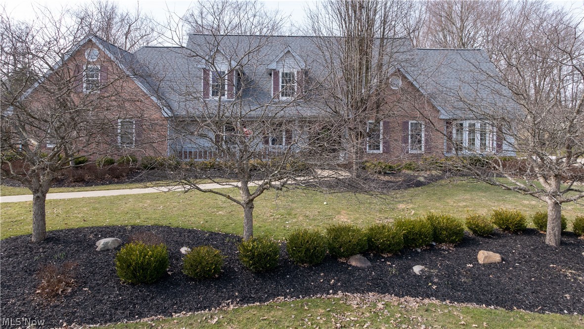 Can you say AWESOME!? This IS the one you have been waiting for! Located in the highly sought after Country Lakes Community, this GORGEOUS Home offers 4 bedrooms plus loft for additional sleeping or play area or use as a Library or Study, 3 Full Baths including the most stunning Owners Bathroom you will ever have the PLEASURE of Relaxing in, wait until you see the professionally designed beautifully jetted tub w/ full granite & tile surround, separate porcelain shower with Rain Glass, step onto the HEATED floor & view the gorgeous custom cabinets with all the extras including scroll detail, pillar & crown trim, specialty lighting, glass, painted & glazed, specialty hardware & more! The large walk in closet is plentiful! Owners Bedrm has extra tall tray ceiling & bath is also extended. Great Room with Fireplace accommodates plenty of entertaining & is overlooked by the Loft Study. Gorgeous Kitchen designed to cook & serve with breakfast bar open to the Sunroom currently with custom tabl