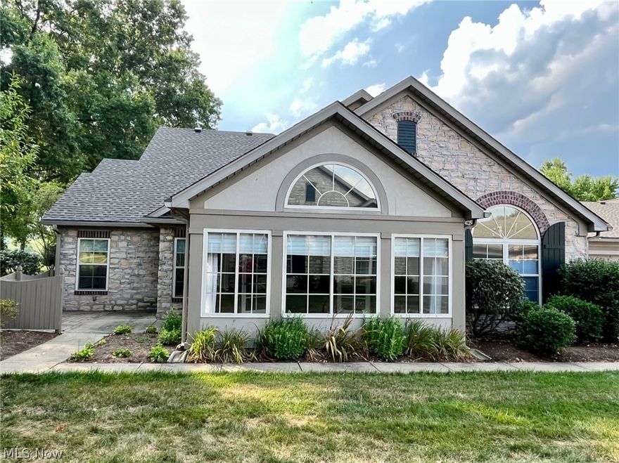 Relax and enjoy the convenience of condo living in Williamstown.  This lovely 2 bedroom, 2 bath home offers an open floor plan with cathedral ceilings throughout.  The spacious great room for entertaining friends features a corner fireplace with new gas logs.  The kitchen offers raised-panel oak cabinets, large pantry, a breakfast bar with ample seating and stainless steel appliances.  The dining area is open to the kitchen and great room.  Through the great room french doors is featured a lovely sunroom/den with lots of ambient light flowing throughout.  Featured throughout are custom-made Bali blinds which open from both the top and bottom for desired security and lighting choices.  The kitchen, dining, great room and sunroom have all had recently installed luxury vinyl tile floors for low maintenance and beauty.  The large master bedroom features a walk-in closet, and the bath has a 5' shower and a seating area at the vanity.  The guest bedroom also offers a large walk-in closet. The main bath has a fabulous new walk-in tub and both baths feature new toilets with heated seats and a bidet.  Featured in the bedrooms and sunroom is a lovely half-moon window above the main window.  Relax on the private patio surrounded by lovely landscaping or join your friends in the clubhouse with a heated pool, fitness room, kitchen and game room.  Live the good life!