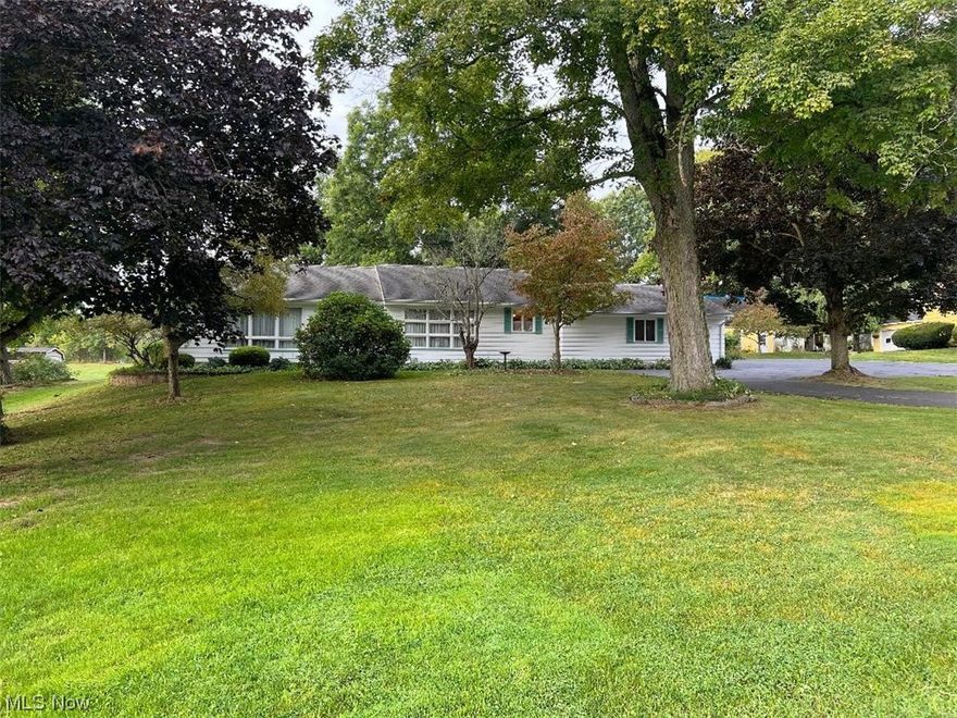 Beautifully maintained and loved Ranch Home available for the first time!  This home includes a spacious master bedroom with an updated ensuite bathroom which includes a separate washer/dryer hook up.  Two other bedrooms, a kitchen/dining combo and a large living room with customer fireplace completes the first floor.  The basement includes a finished rec room with fireplace, large laundry area and another large room ready to be creatively finished.  Also included is a two car attached garage in addition to a large outbuilding with garage space and a workshop.  This home is beautiful landscaped and will not last long.