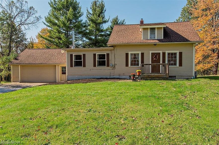 Cozy 3 bedroom 2 full bathroom bungalow in the heart of Geauga County. This is your chance to enjoy beautifully refinished original hardwood floors throughout a semi-open floor plan. The dining room boasts built in corner hutches and historic colors. The family room centers around a high efficiency wood burning stove and has a hook-up for a gas fireplace. Recently refreshed kitchen has plenty of storage and counter space, all new fixtures and a center island with bar stools. All kitchen appliances included. One floor living is truly possible with washer and dryer hook-ups in mud room as well as the basement. With 2 bedrooms and full bath upstairs and one bedroom/library and a full bath on the first floor, entertaining overnight guests with privacy is easy. The backyard includes a 500 sq ft deck, power ready for hot tub, or just relaxing, overlooking the fire pit and sandstone patio nestled under the whispering pines. 2018-Refresh of kitchen, staircase, hallway, and mudroom including al