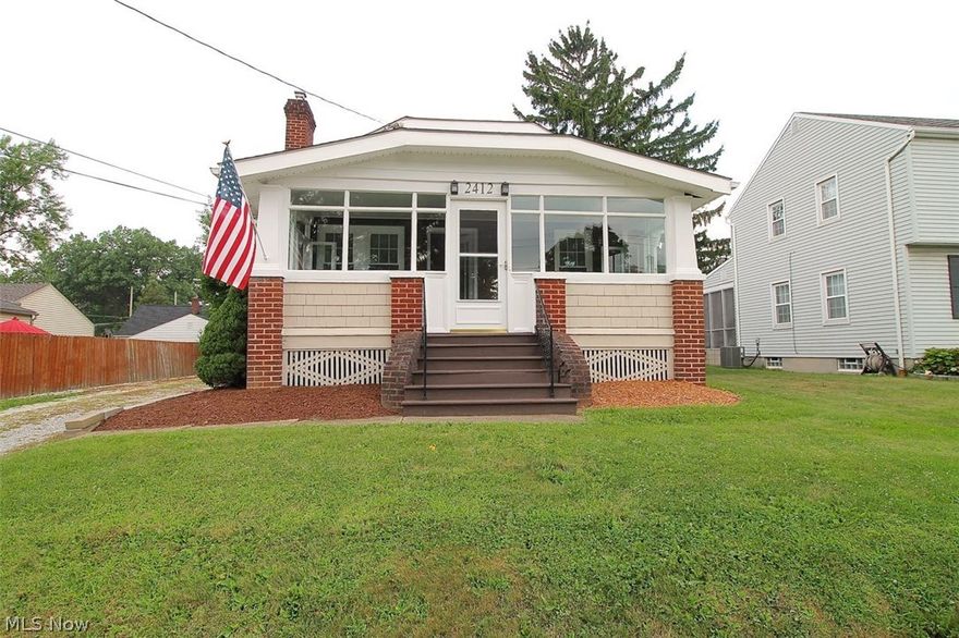 Welcome to this fabulous updated two bedroom, 1 full bath brick ranch home!  As you cross the thresh hold up the stained front steps to the large covered front porch that you can easily enjoy reading a book, playing a game or just relaxing. Enter into the living room that has a fireplace to enjoy on those cold winter nights, which is open to the large dining room where both rooms offer gorgeous refinished hardwood floors. Next you find the bright large kitchen with plenty of counter space and cabinets, with room for a small table to enjoy your morning cup of coffee or juice. Two bedrooms with gorgeous refinished hardwood floors and one full bath finishes the main level.  In the basement there is a finished portion which is great for entertaining, or use it as an office space. Outside there is a one car garage with attached shed for all your outside tools, plus there is a swing to enjoy while relaxing in the fenced in backyard.  There are newer light fixtures throughout this amazing hom