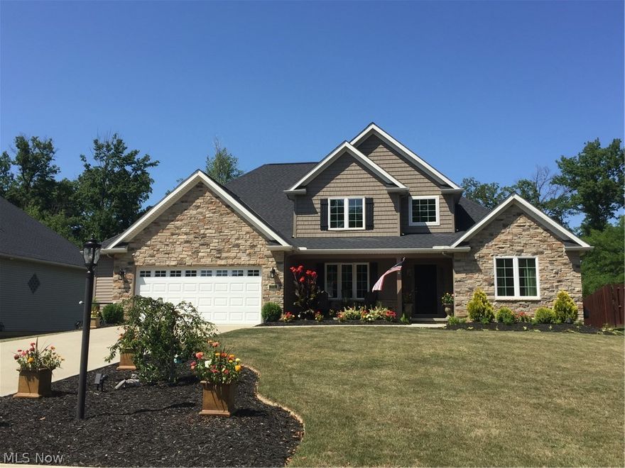 This beautiful cape cod style home located on a quite cup-de-sac street is move in ready with easy access to I-71 and I-80. First floor master bedroom with a large luxury bathroom including a tile shower.  Large walk in closet.  Elegant two story foyer opening to a soaring two story great room with magnificent view of the large back yard.  The kitchen you will love to entertain in has a large granite island and a walk in pantry.  The hardwood floor guides you from the foyer to your kitchen including the dining room. Second floor loft overlooks the great room that keeps this open floor plan nice and bright even on the cloudiest days.  The full basement has a rough in for a future full bathroom.  The two car garage is also oversized to help handle your extra toys and equipment.  This house is loaded with extras and is a must see