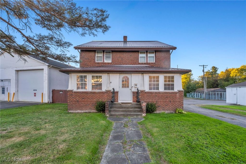 Photo of 310 S Milton Boulevard, Newton Falls, OH 44444 (MLS # 5165119)