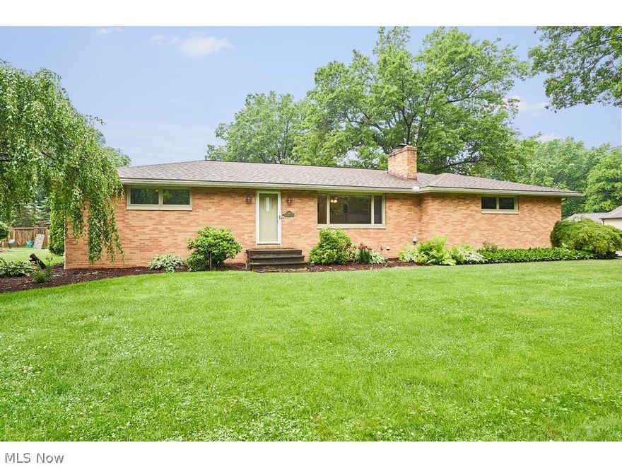 Great all brick ranch with first floor laundry, newer roof and finished basement. Two bedrooms on main level plus First floor laundry! Large living room with sand stone fireplace and picture window  Kitchen, back hall and laundry room with newer wood floor- approx 2015.Newer Large family room in lower level with 2 more bedrooms and remodeled full bath! This makes perfect space for guests or teens!!  Roof tear off approx 2010.  2 car garage side load-