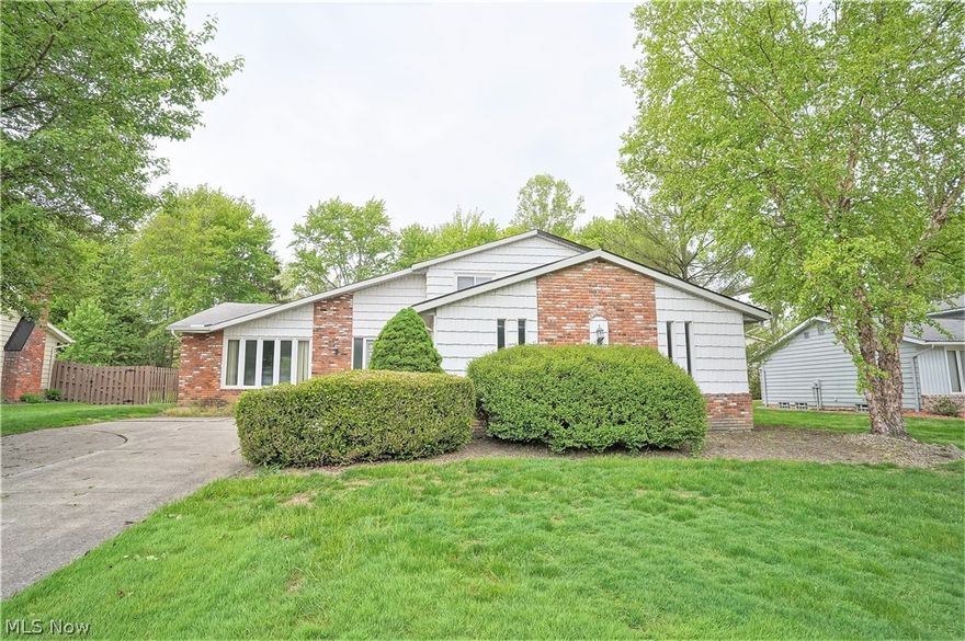 Welcome to this five bedroom, two and half bath split level home. Needs some updating but has significant upside! All the room you ever wanted! This home offers so much, large living room with brick mantle, sliding door to the patio and fenced in backyard. Open to the beautiful eat in kitchen which has abundant of cabinets, island, cooktop, double wall ovens, dishwasher, refrigerator. There is a family room and dining room. Bedroom, laundry, half bath all on the main level. Upstairs you have three bedrooms, and three full bathrooms. There is a full waterproofed finished basement with more storage space, built in cabinets, newer furnace. Two car attached garage. Precious memories begin right here! WOW!