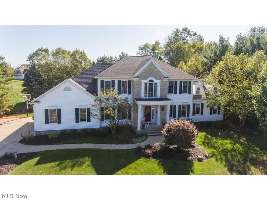 Welcome home to your Prestige-built custom colonial in the desirable Swan Lake neighborhood! Nothing to do but move in. Featuring 4 bedrooms, three full and two half-baths, this home has been meticulously cared for and thoroughly updated by the owners. Gleaming hardwood floors greet you at the entrance and extend throughout the dining room, study, kitchen and powder room. Yoder Wood and Design custom cabinetry in the study, kitchen, powder room, and laundry. Expansive family room includes updated fireplace with new custom mantle and surround. Enjoy your favorite movies and sporting events with surround sound in the family room, lower level media room and outdoor deck. Private, tree-lined backyard with deck and brick patio makes indoor/outdoor entertaining a breeze. Or, enjoy the neighborhood tennis courts, swimming pool and clubhouse! Additional home updates include new roof (2018), new windows, new HVAC -- including April Air Whole House Humidifier (2017), and new water heater (2019).