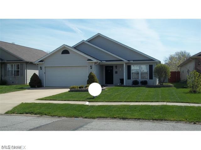 This may be one of the most beautiful homes in the area! With almost 1,500 sq. ft., this 3 bedroom, 2 full bathroom Ranch offers a new hot water tank, new roof, new sun tunnel in kitchen, new stainless steel quality appliances, dark laminate flooring in the kitchen, laundry room and entry way, carpet in other rooms, porcelain tile floors in the two bathrooms, and updated bathroom mirrors and lighting. The amount of storage this home provides is unbelievable. Large fenced-in backyard with a 10" x 15" patio and a sidewalk leading from the patio to the driveway. Custom window treatments in the great room stay with the home. The two-car garage features a workbench, shelving, and pull-down steps to the attic for additional storage. The home is conveniently located, which makes walking or driving to local businesses, schools, parks, etc. easy. This is a MUST-SEE home!