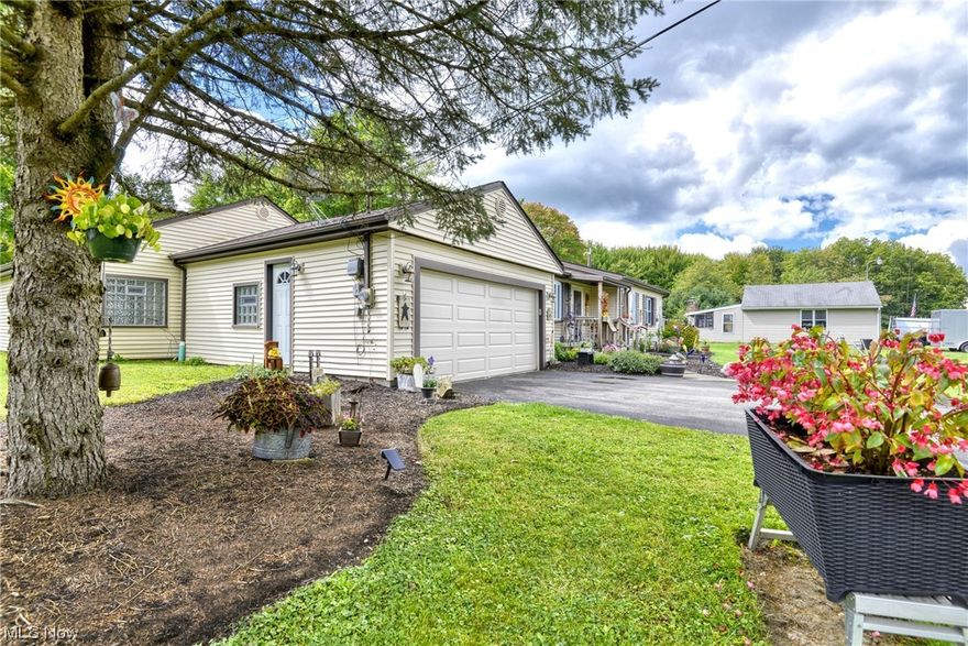 Here is your chance for spacious country living on 2 acres of wooded property. Kitchen and bathrooms have been completely upgraded in 2021. New laminate floors throughout the house with existing original hardwood floors. New furnace and air condenser installed by Gault Heating and cooling in 2022. New fan added in bedroom. Two car garage also features large extension area for added storage space or 3rd car and new glass block installed in 2021. Paved driveway has a added 3 parking spots for guests or easy turn around. Private backyard patio is cement slab and would make a great place to cookout with plenty of room for patio furniture. Includes new washer, dryer, stove, fridge, microwave and dishwasher. Keep you lawn equipment in the double door shed in backyard. This house is in great condition and ready to enjoy!