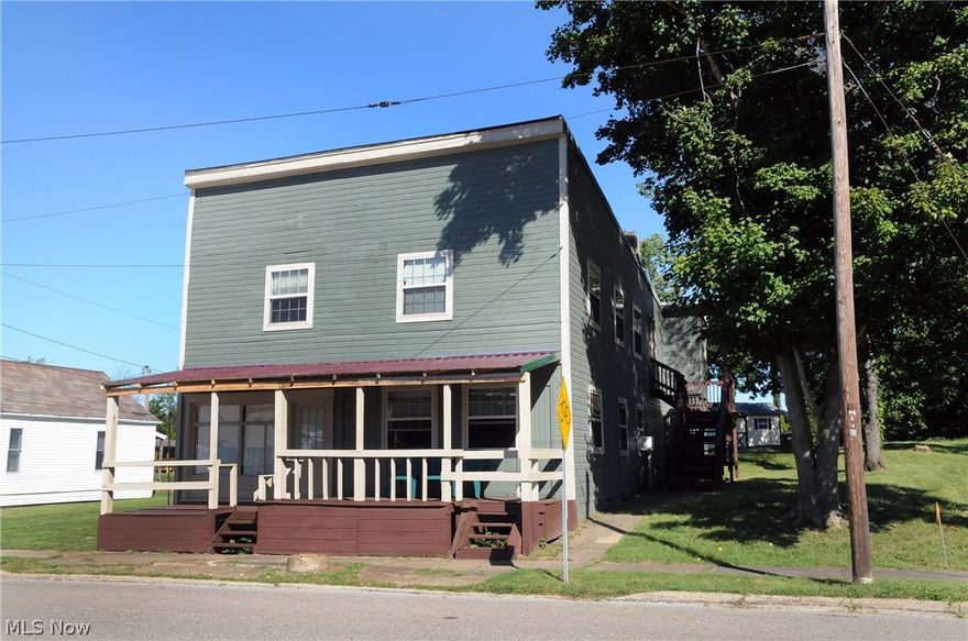 Built in 1925, this property once served as a General Store in Lore City.  The current owners purchased the building in rough condition and have done too many updates to list.  Attached to Res. Disclosures is a detailed list of all improvements. The downstairs apartment needs minor finishes & both upstairs apartments are in beautiful condition.  You really need to see to appreciate.  Apartments upstairs are fully furnished.  Several materials left to finish downstairs apt.  Apartments had been rented for $1,200 including utilities.   Very nicely finished, 2 apartments-3rd in process.