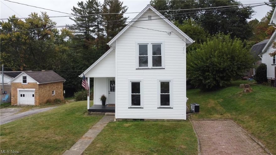 Do you love all things modern farmhouse? Well, this is the home for you! You will love all this home has to offer right in tusky valley schools and in the center of mineral city! The entire living space has been completely updated from the ceilings and walls being replaced, to the kitchen and bathrooms being updated! Enter the adorable front porch into the large open kitchen. The first floor laundry room has been updated and can even be used as a walk in pantry! Around the corner you'll find a coffee bar station, full bathroom and living room with so much beautiful natural light. Upstairs, you'll find 2 bedrooms, featuring a nice size master bedroom and a full bathroom! Other updates include brand new central air system, paint, interior/exterior door replacement, flooring trim and so much more. Perfect turn-key home for a first home, next home, or for an investment property! Just move in and relax-  Call to schedule your showing today.