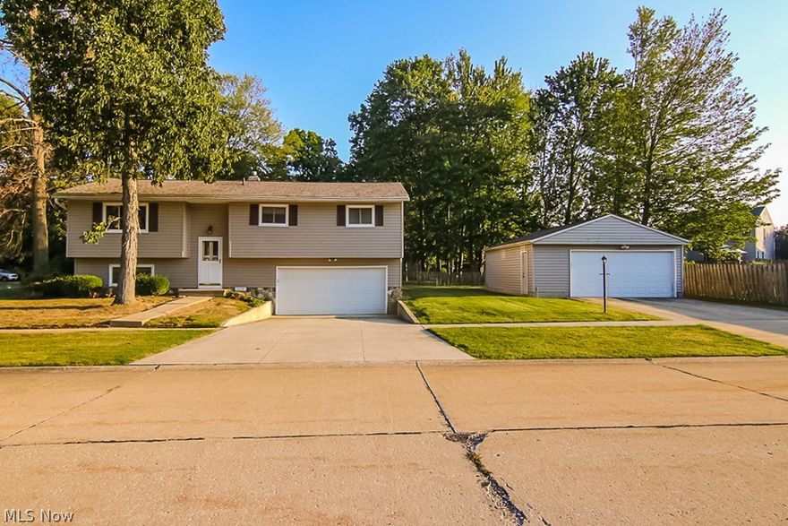 Welcome home to this meticulously maintained 4 bedroom home! This home is FULL of features which includes freshly painted interior, new carpet throughout both levels, new vinyl flooring in the kitchen, new carpet in the heated enclosed back porch, a complete roof tear off and new gutters apprx 3 years ago, furnace replaced apprx 4 years ago, a new detached garage which was installed apprx 8-10 years ago (so a total of 4 car garage now!), driveway redone, basement waterproofed by Ohio State Waterproofing in 2017, insulated attic, and an Aprilaire humidifier! Scheduled your showing today before this one is gone!!