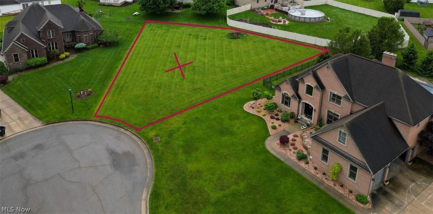 WOW!!!! What an opportunity to build your dream home on a beautiful lot located on a Cul de sac in Huntington Woods with a view of Mill Creek Park across the street! Almost 1/2 an acre. City utilities, cleared, ready to build, surrounded by amazing homes. Private yet close to EVERYTHING. Take a drive by and see for yourself how perfect this location is.