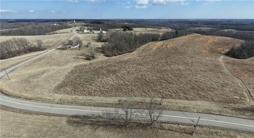 Online Auction begins ending Saturday, April 11th, at 11:00 AM. Parcel 5: 6.5 Acres Open ground. 720’ Frontage on Pinecrest Drive.The open acreage consists of a mix of hay fields and pasture, complete with a spring-fed water trough and a pond. The wooded acreage features an assortment of young and maturing hardwoods and is highlighted by rolling terrain, ravines, natural pinch points, and a creek running through the property—ideal for recreation, wildlife habitat, or long-term timber potential. Overall, the land offers an excellent balance of open and wooded ground with gently rolling topography throughout. Conveniently located with easy access to I-70, the property provides a straightforward commute to Columbus or Cambridge while maintaining a true country setting.
