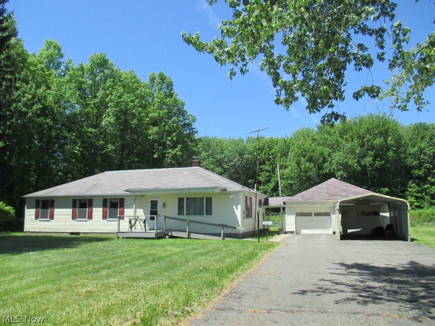 Diamond in the rough.  5 acres Header.  Living room with fireplace, 3 bedrooms, 4 x 10 Room for office, eat in kitchen.  Hardwood floors in most rooms.  1st floor utility room, crawl space.  2+ car garage, car port, black top drive all on 5 acres!  Sold "As Is"  Seller will escrow for septic depending upon price.  Oil Heat.