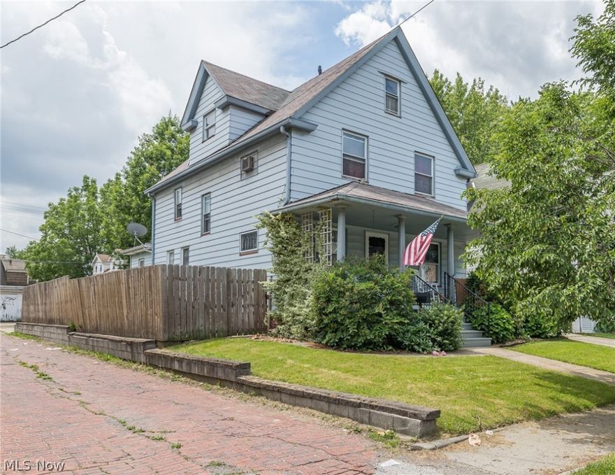Let's take a walk back in time....This lovely colonial built in 1915 has so much character and has been so nicely maintained you will feel good the moment you enter into this home.  This property offers 0ver 1700 sqft. 4/5 Bedrooms, one bedroom on the upper level is being utilized as an office but could easily be used as a bedroom without a closet.  The foyer shouts Welcome the moment you walk in with a formal living and dining room and a large eat in kitchen.  There was a bedroom suite added, handicap modified to the rear of the home and very tastefully done.  The staircase going to the upper level is beautiful and there is another stairway in the back that at one time was the stairs for the servant's quarters.  This home is right next to the alley which adds even more charm.  There is a  six foot privacy fenced in backyard.  There is also a ramp leading to the first floor bedroom from the rear of the home.  Great two car detached garage that you can enter the backyard through the man