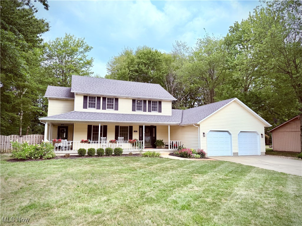 Tucked away on a quiet street in the heart of Amherst, 1125 Royal Drive blends updated comfort with everyday functionality, offering just under half an acre of space to settle in and stretch out. Inside, the main level welcomes you with hardwood floors, a spacious layout, and thoughtful updates throughout. The recently renovated kitchen features quartz countertops, modern lighting, new appliances, and refreshed cabinetry ready for daily meals or weekend hosting. Adjacent, the large family room impresses with vaulted ceilings, built-in shelving, and a fireplace that invites cozy evenings year-round. With four bedrooms and three fully updated bathrooms including a refreshed full bath upstairs and a fully remodeled en suite in the primary suite (complete with walk-in shower, jetted tub, dual vanity, and new vinyl flooring) this home offers both space and comfort. New carpet throughout adds a fresh feel, and main-level laundry makes life a little easier. Step outside to take in the home's standout features: a wrap-around porch, a large three-seasons room with backyard views, and a private, fenced-in yard with a firepit area designed for gathering. A two-car attached garage is complemented by a separate garage/storage building perfect for hobbies, tools, or extra storage. The home also features a new HVAC system (2019) and is ideally located near Amherst's historic downtown, schools, shopping, dining, and easy access to highways and Lake Erie. Whether you're hosting guests or just enjoying the peaceful setting, 1125 Royal Drive is a home that balances character, updates, and usable space-inside and out. Schedule your private viewing of this gorgeous home today!