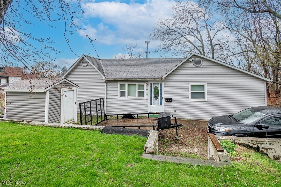 Welcome home to 720 Bridget Street! Enjoy first floor living in this two bedroom, one bathroom ranch nestled on a 3 parcel lot. Enter into a large living room with two nearby bedrooms and a full bathroom. The kitchen comes complete with all appliances. Continue into the attached dining room with access to the side driveaway and lower level. The basement offers ample storage space along with a laundry area. Furnace 2014. New siding and gutters 2010. Property must be sold with 450 Bettie St, Akron, OH 44306, MLS #5030548. Properties have shared driveway. Don't miss your opportunity to own these two great properties boasting 5 parcels! Schedule your private viewing today!