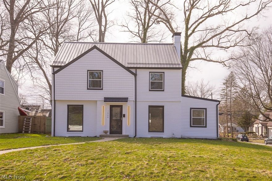 Newly Renovated Colonial in West Akron! This house has been completely remodeled from top to bottom with a front facing view of Good Park Golf Course and the sellers have gone above and beyond in providing intricate details to add to this home's appeal. This property is complete with three spacious bedrooms (and an oversized master with two closets), two full baths, one half bath, a two car attached garage and a brand new customized kitchen, with butcher block countertops, porcelain floors and brand new cabinetry with state of the art appliances. The hardwood floors throughout add to this home's character. Entertain guests in the finished lower level with a full bath complete with the same porcelain floors, or hold conversations at the kitchen island whilst meals are being prepared. The updates are listed as follows: Hot water heater 2026; a new metal roof, updated plumbing, an upgraded half bath, upgraded kitchen, upgraded recessed lighting  with night features and two full bathrooms all done in 2025; concrter work, furnace and central air added in 2024. Property is in close proximity to St. Sebastian School and I-77; open enrollment is also an option for a desired school district. Please contact a real estate professional to schedule your private showing today!