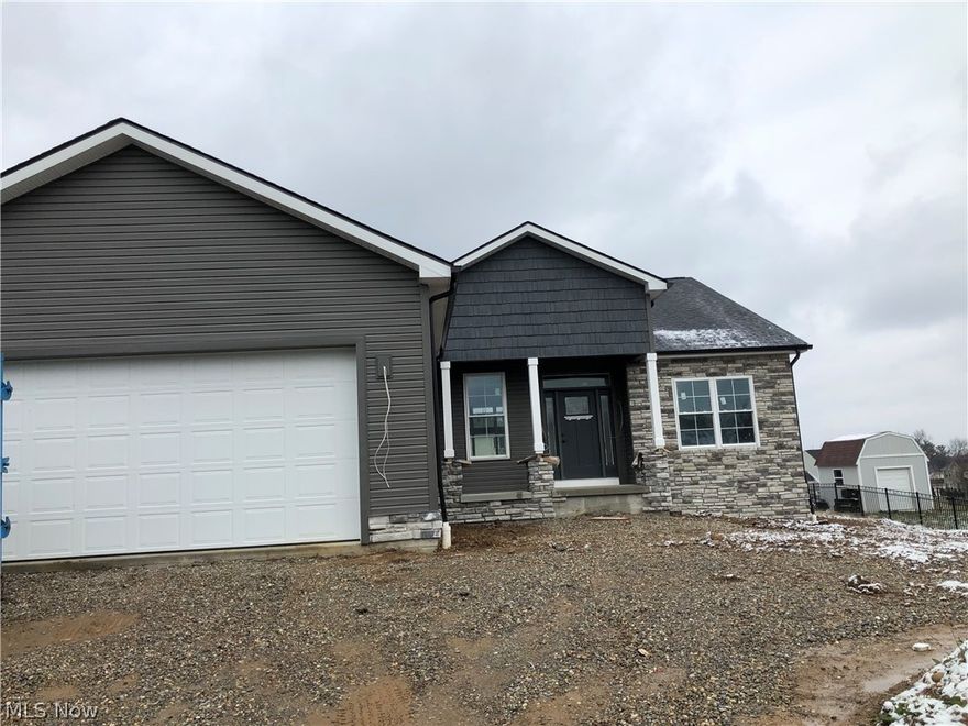 BRAND NEW RANCH-2307 square feet with a 14-year tax abatement, this means you only pay taxes on the lot, for 14 years. Open concept great room. The kitchen, dining room, foyer all centrally located. Master Bedroom with Master Bath and walk-in closets.2 other spacious bedrooms with adjoining baths.Entry room/mudroom from the garage leads to first-floor laundry. Double garage with water. The great room leads out to the covered concrete patio. lower level boasts another 2000sq ft 

All inquires can be made to Butch Mankowski 330-605-3693